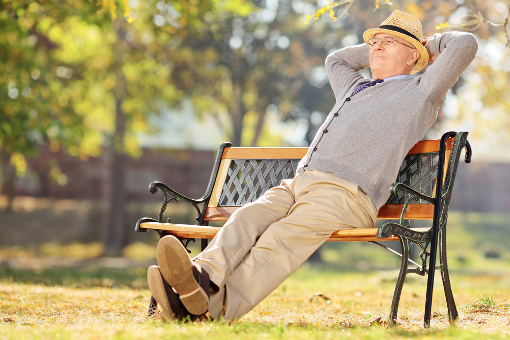 old man relaxing on a bench