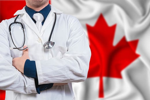doctor in front of canadian flag