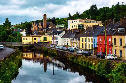 houses in ireland beside a river