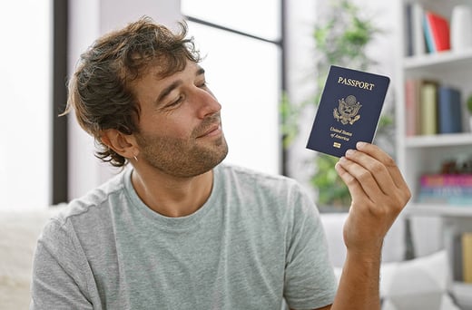 man holding a us passport