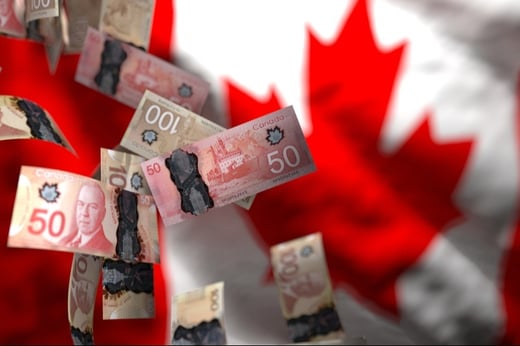 money in front of canada flag 800