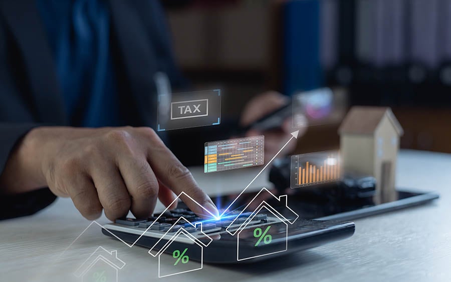 tax concept with property and calculator