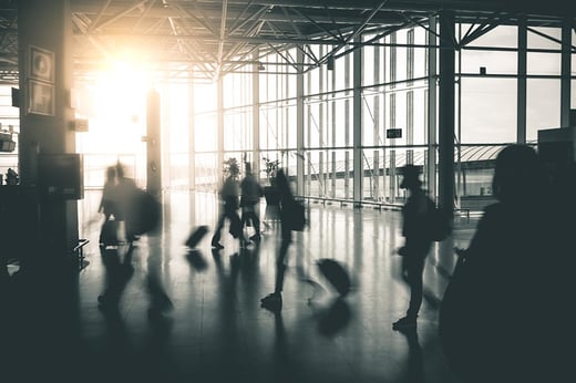 travellers moving around an airport