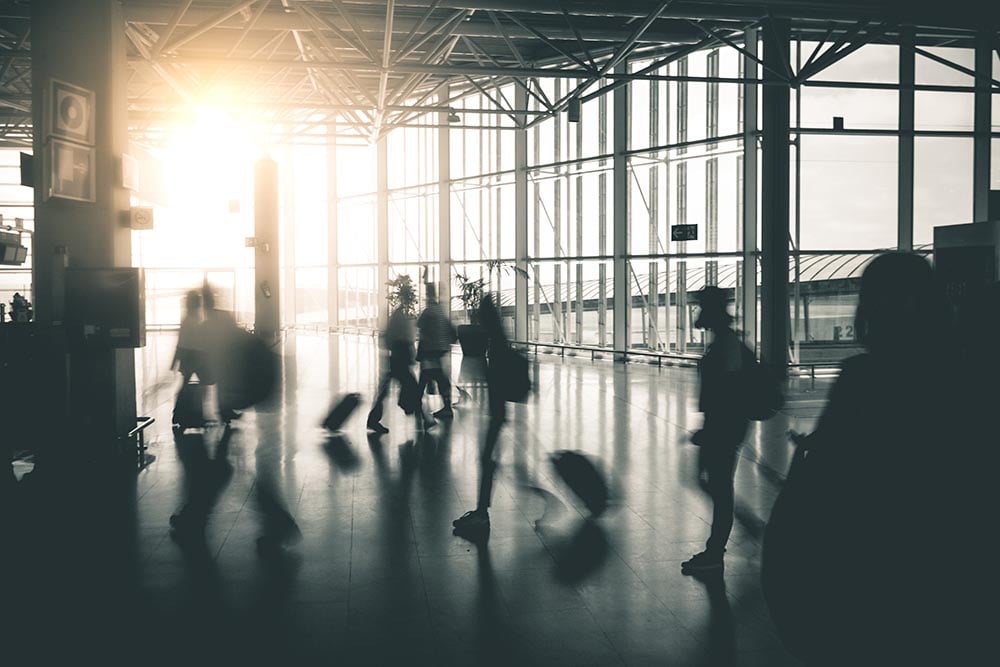 travellers moving around an airport