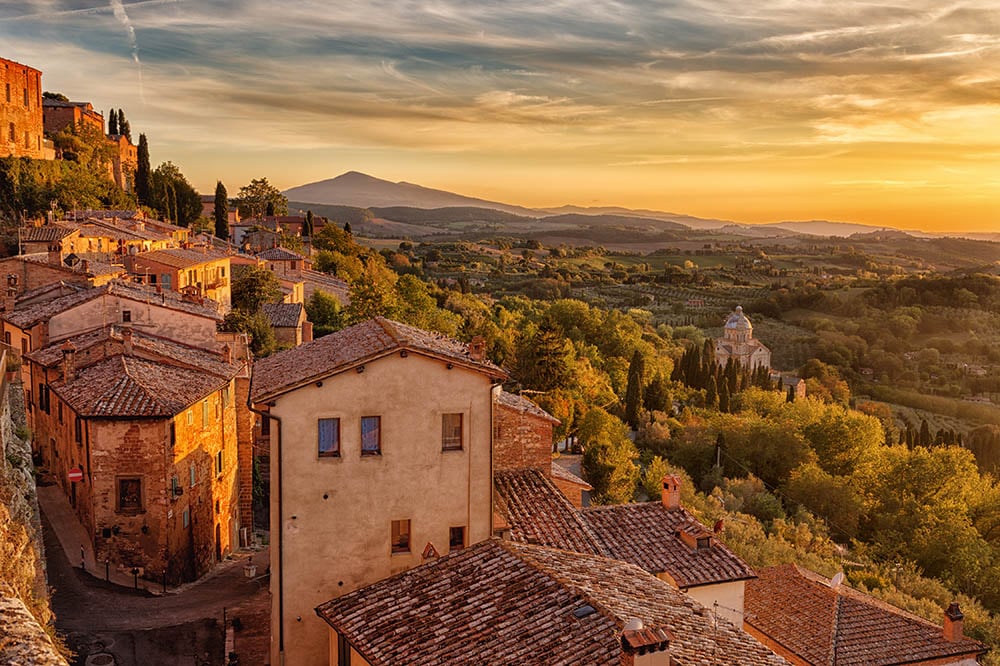 tuscan sunset with townhouses in the foreground