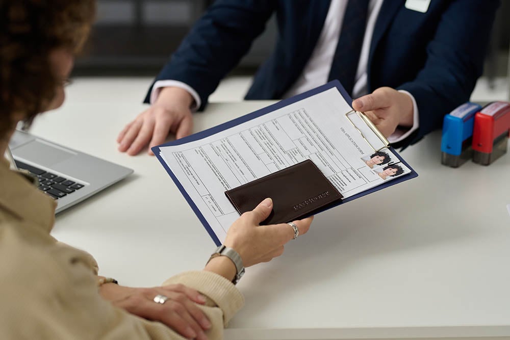visa application being handed over