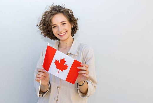 woman holding canada flag