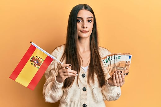 woman holding money and spanish flag 1000